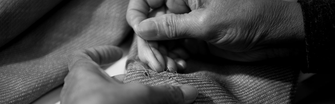 Zegna Workers Hand Stitching a Garment